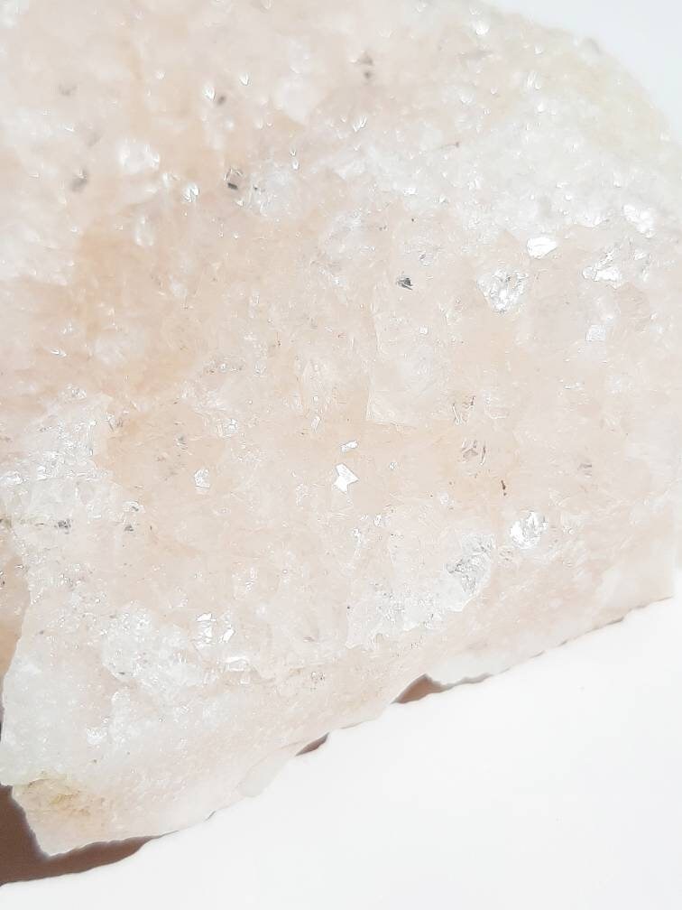 Medium size glittery pink apophyllite crystal
