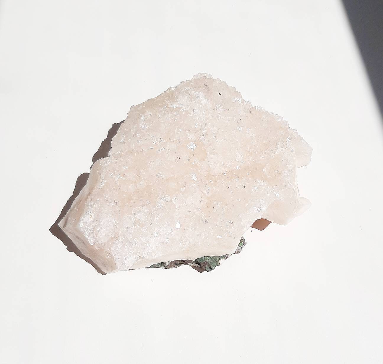 Medium size glittery pink apophyllite crystal