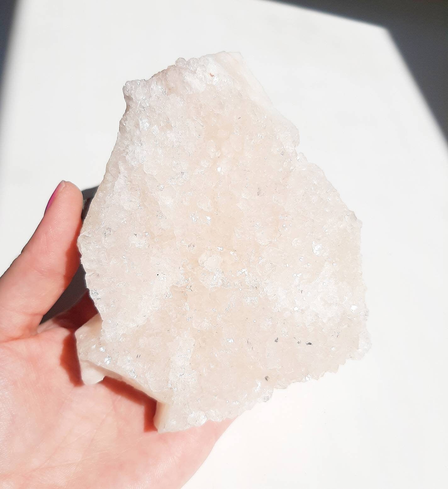 Medium size glittery pink apophyllite crystal