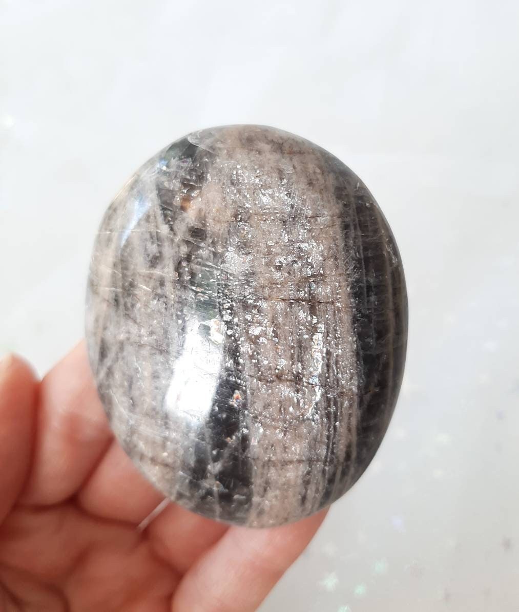 Black moonstone palm stone