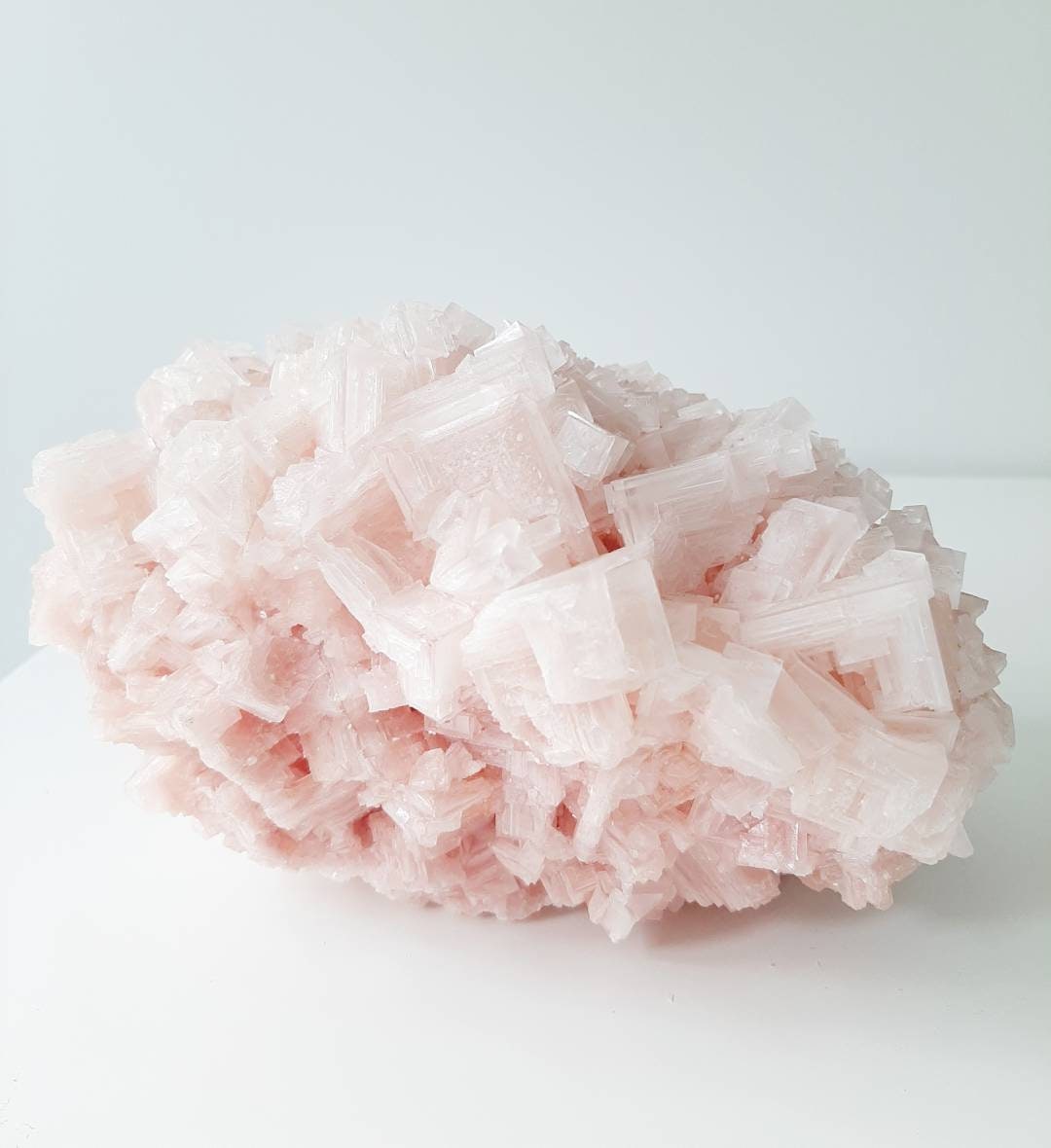 Enormous pink halite crystal cluster