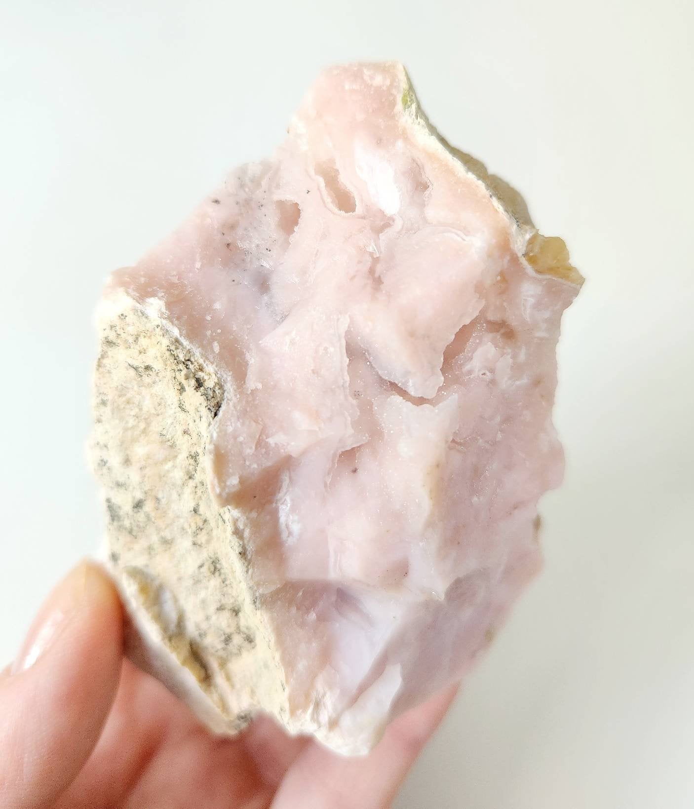 Pink opal with sugar coated crystal caves