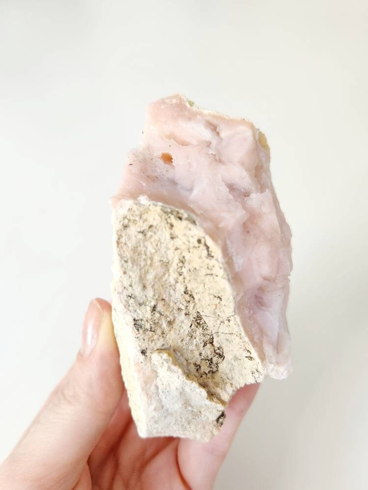 Pink opal with sugar coated crystal caves