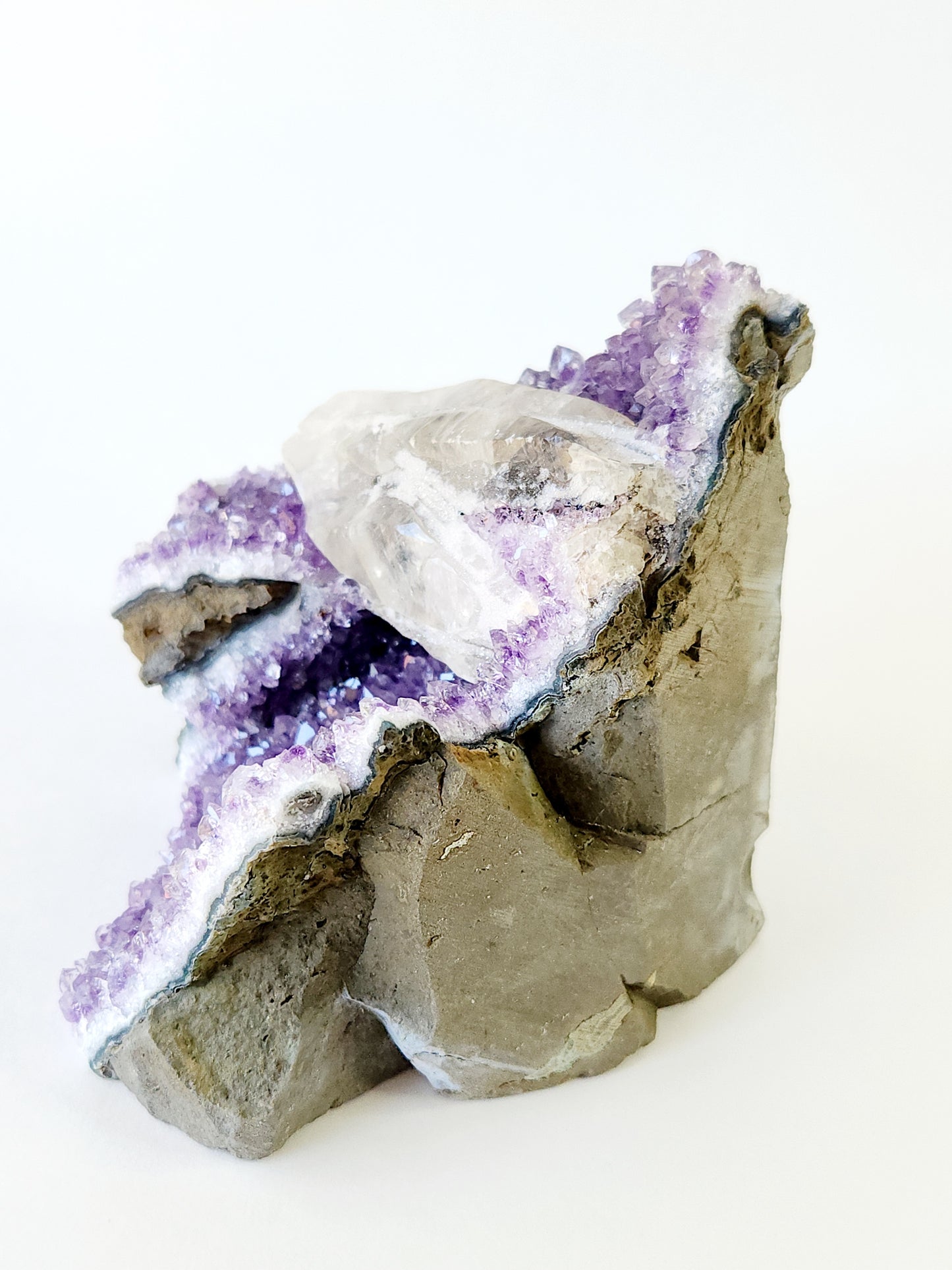 Amethyst and calcite sugar crystal cut base