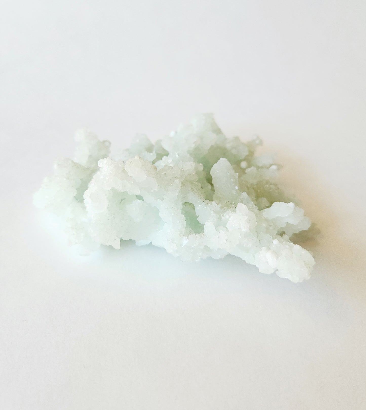 Mint green prehnite with okenite cotton balls