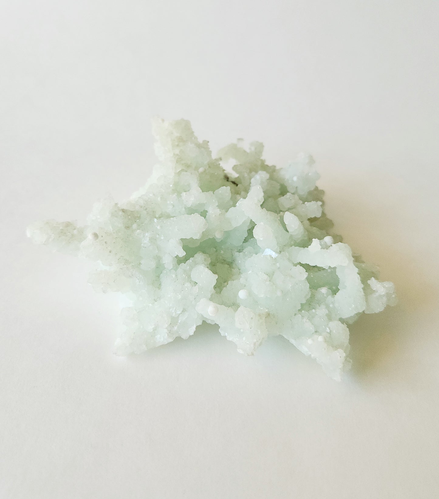 Mint green prehnite with okenite cotton balls