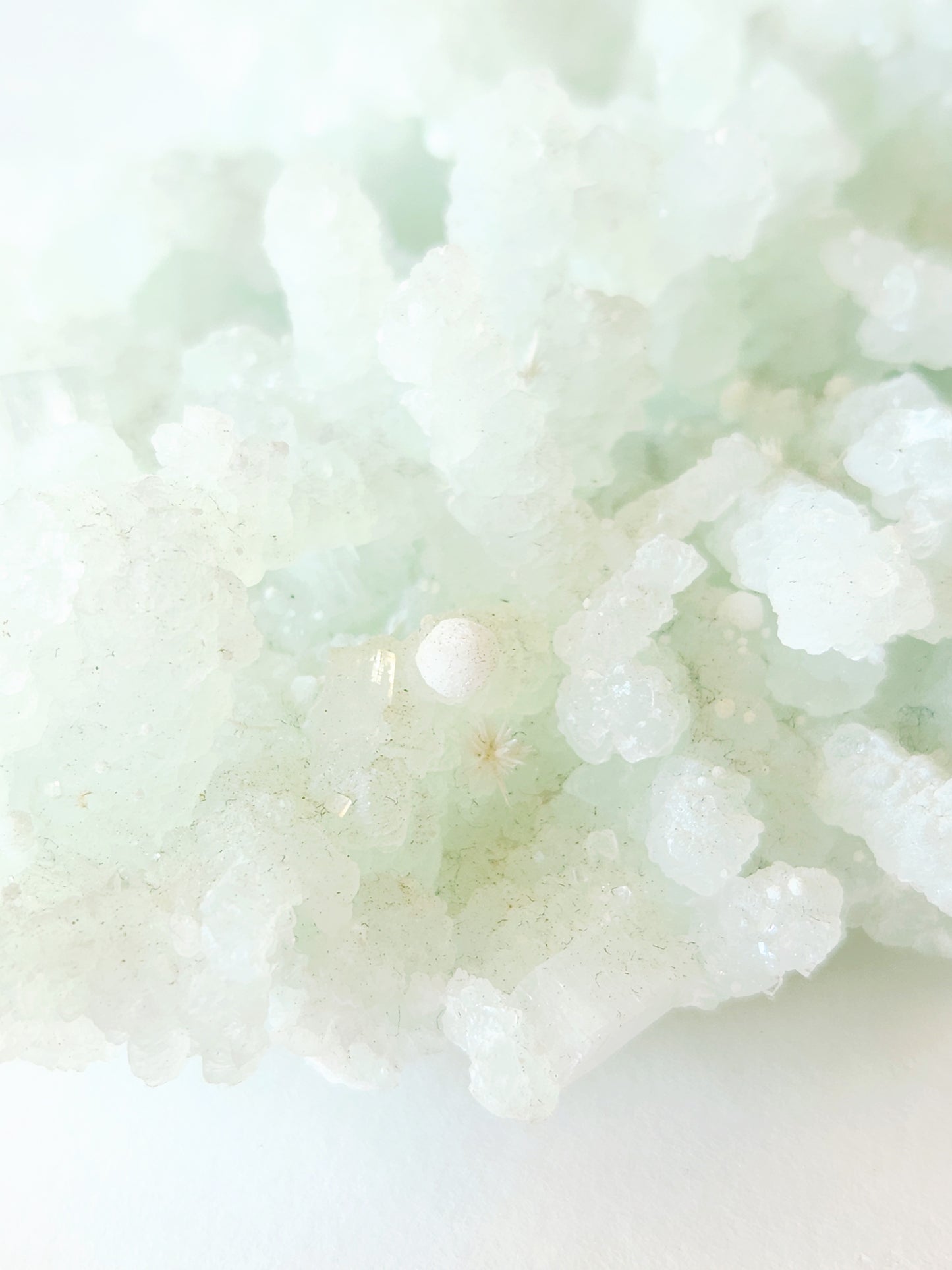 Mint green prehnite with okenite cotton balls