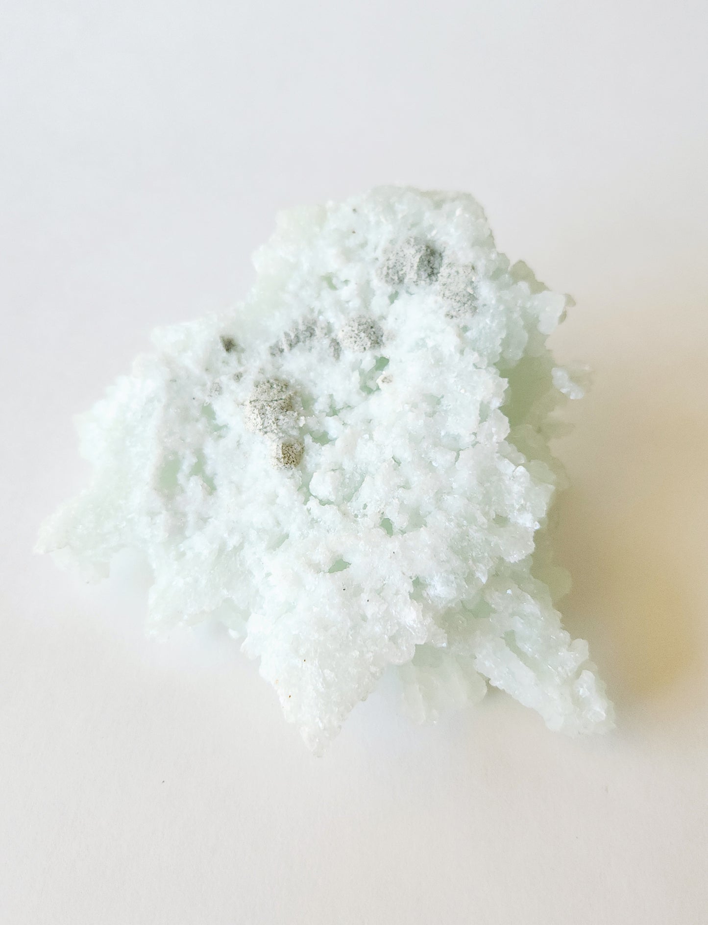 Mint green prehnite with okenite cotton balls