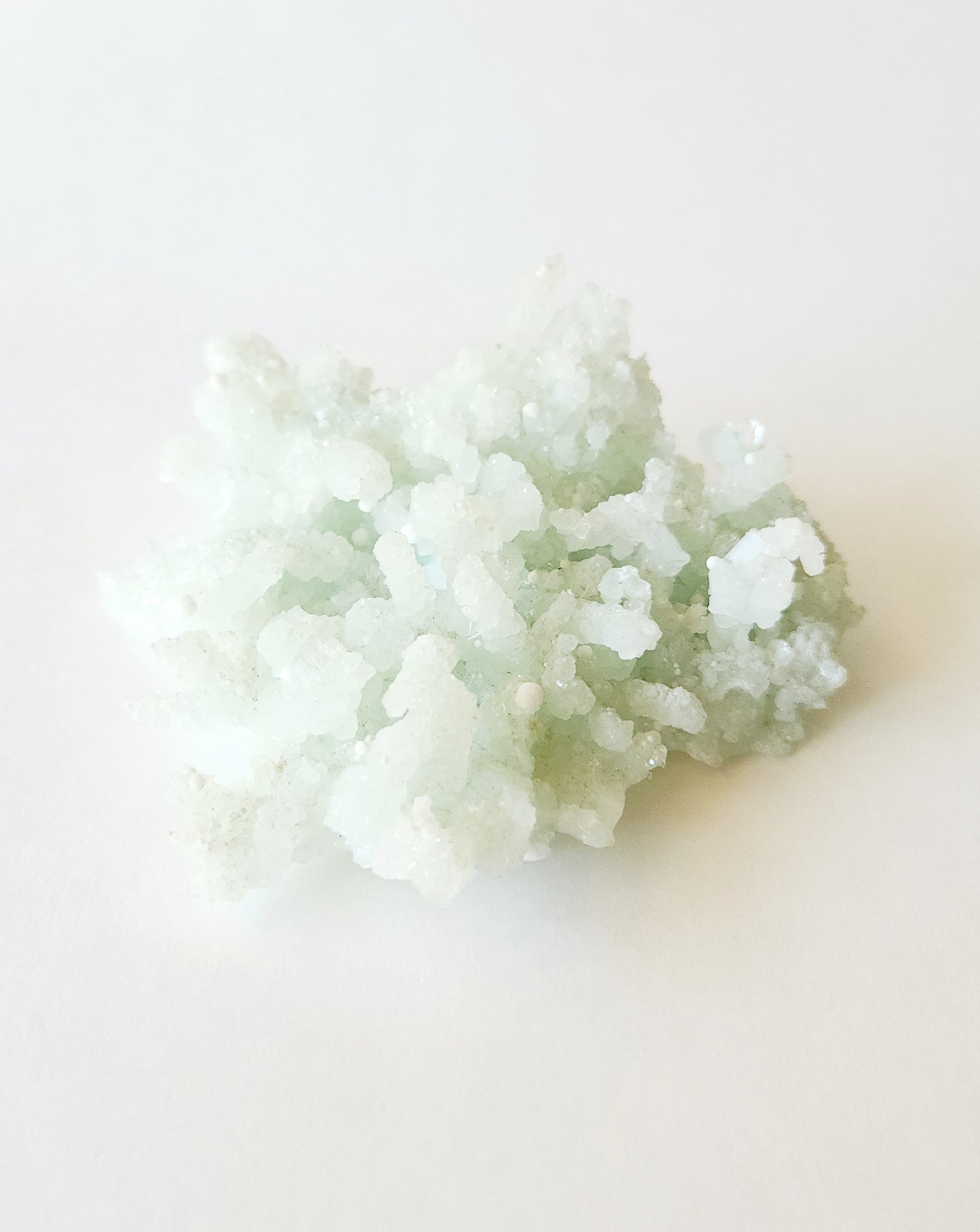 Mint green prehnite with okenite cotton balls