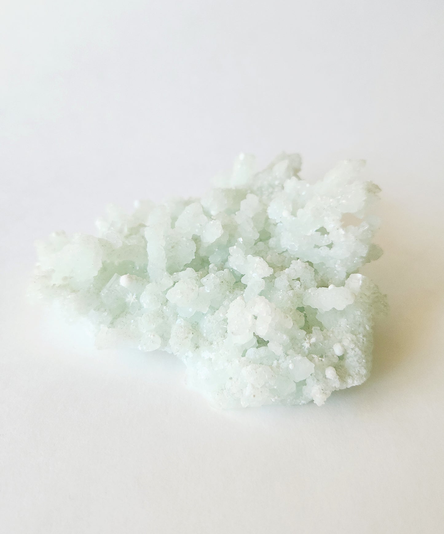 Mint green prehnite with okenite cotton balls