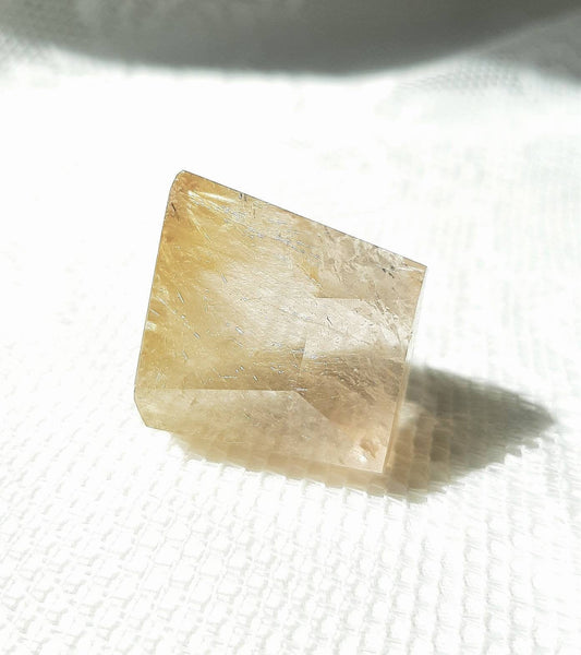 Golden rutile quartz gem