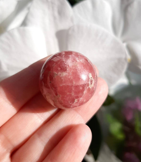 Juicy rhodochrosite sphere