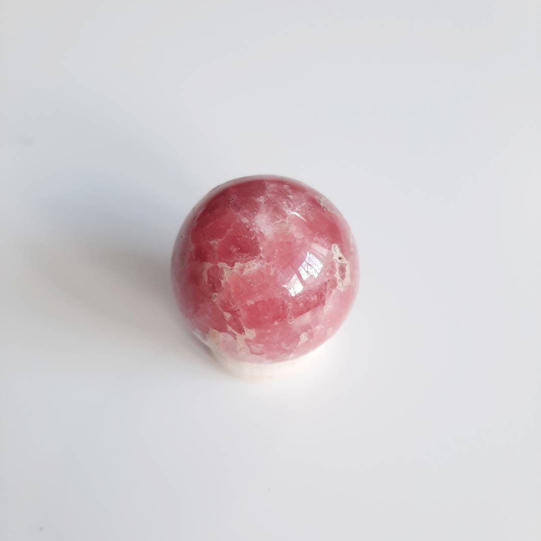 Juicy rhodochrosite sphere