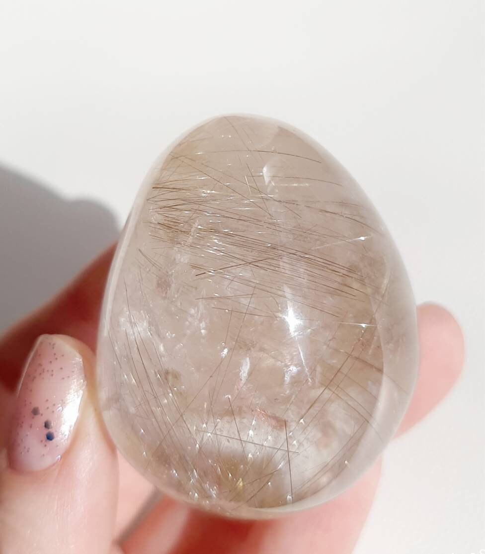 Starburst golden rutile lens