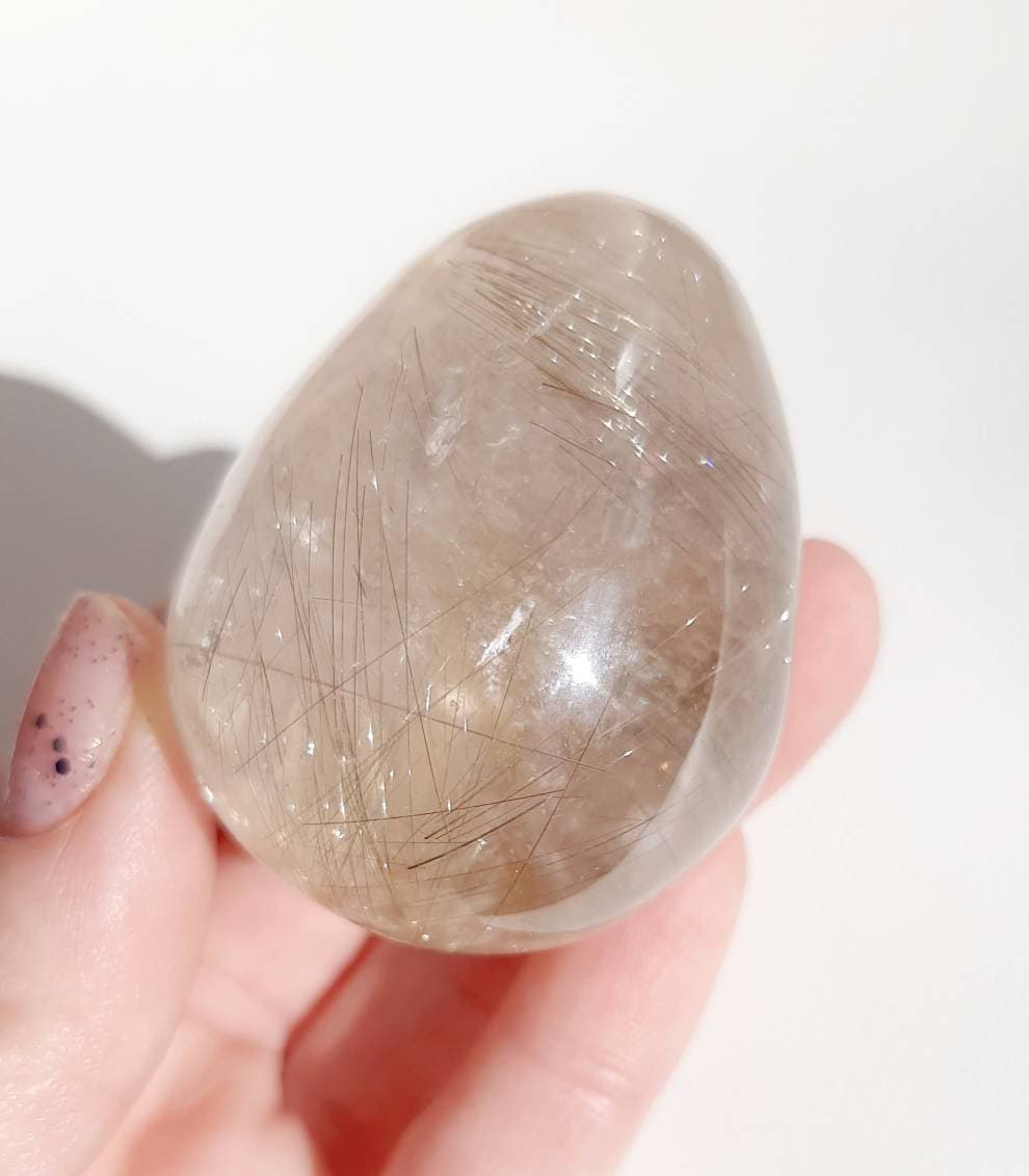 Starburst golden rutile lens