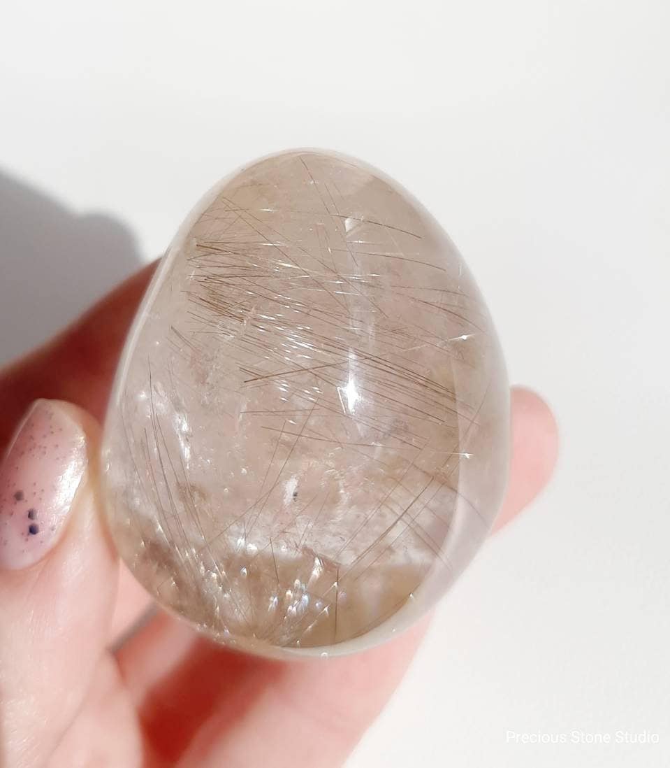 Starburst golden rutile lens