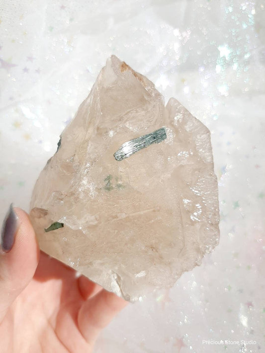 Blue / green tourmaline in elestial smoky quartz